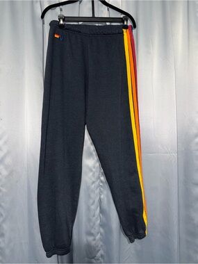 Aviator Nation Black Track Joggers with Red Orange Yellow Side Stripes